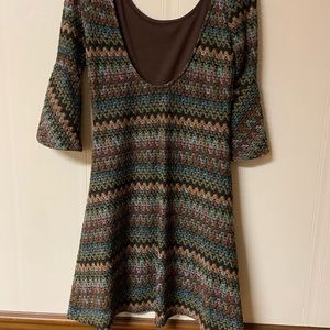 Dress is unique and eye catching. Comfortable material and a lot of style.